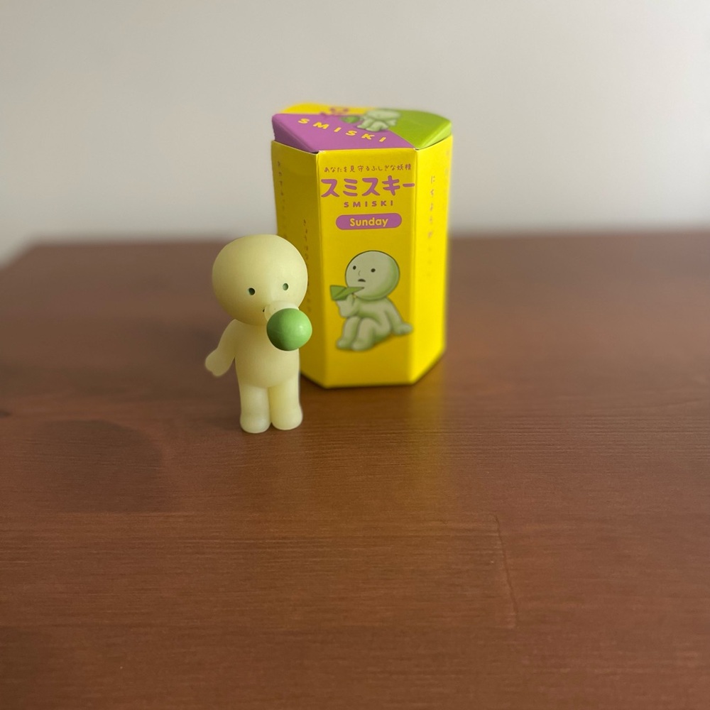 Yellow and Green Kids Toy Figure